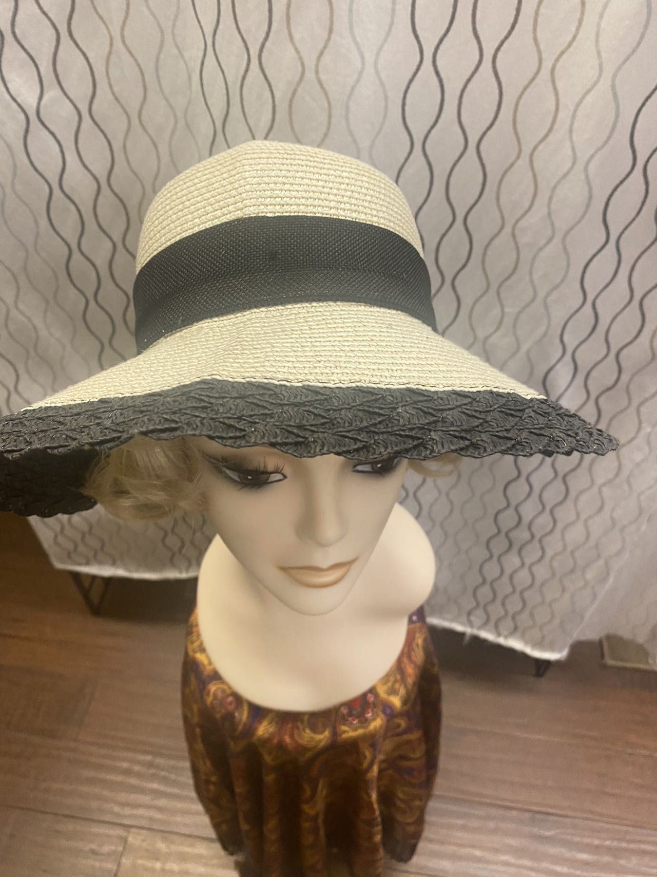 women beige straw sunbonnet with black ribbon