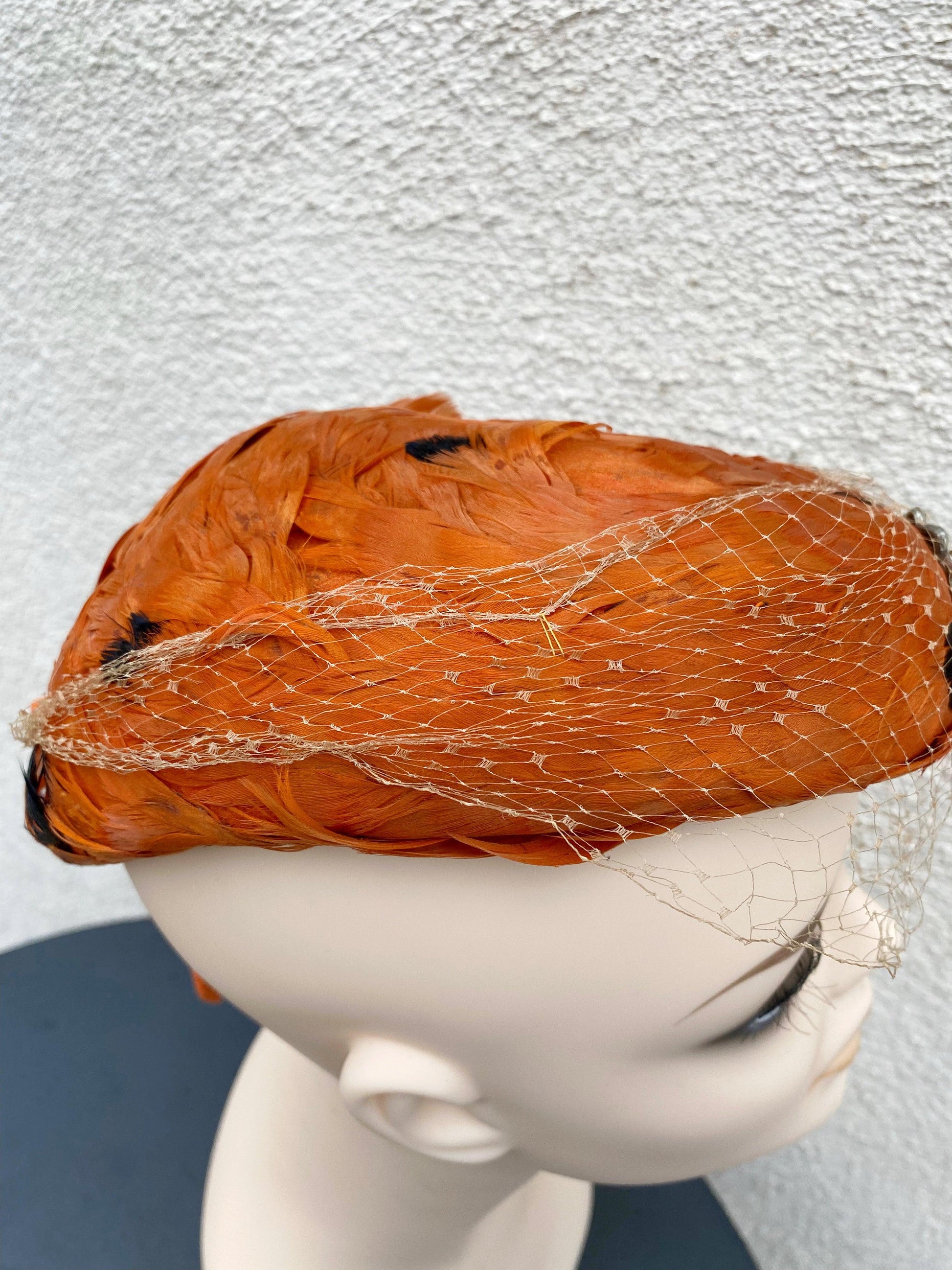 Vintage Bright Orange Feather Hat with Netting & a Rhinestone Broach - A Walk Thru Time Vintage